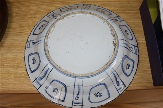 A Chinese Kraak blue and white dish, an Iznik style jar and a Chinese blue and white bowl, bearing a Qianlong mark diameter 36cm